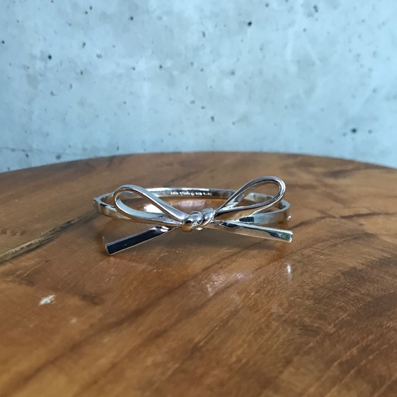 kate spade Jewelry - KATE SPADE Silver Hinged Skinny Mini Bow Bangle